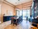 Spacious dining room with natural light, stylish furniture, and backyard access at 20439 E Palomino Dr, Queen Creek, AZ 85142