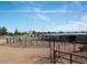 This property has horse facilities including a training area with stalls at 20439 E Palomino Dr, Queen Creek, AZ 85142