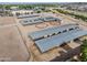 An aerial view of horse property featuring stables, arenas, and plenty of space at 20439 E Palomino Dr, Queen Creek, AZ 85142