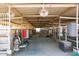 Interior view of the horse stalls featuring an overhead fan system at 20439 E Palomino Dr, Queen Creek, AZ 85142