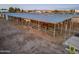This property features multiple horse stalls with horses visible in two of the stalls at 20439 E Palomino Dr, Queen Creek, AZ 85142