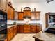 Close-up of kitchen showing the countertop, cabinets, and stainless steel oven at 20439 E Palomino Dr, Queen Creek, AZ 85142