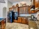 Well-equipped kitchen featuring stainless steel appliances, and ample cabinet space at 20439 E Palomino Dr, Queen Creek, AZ 85142