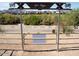 Will Rogers gateway in Queen Creek, AZ with desert landscaping, mountains in the background, and walking path at 20439 E Palomino Dr, Queen Creek, AZ 85142