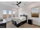 Comfortable bedroom with ample natural light, ceiling fan and neutral colors at 21632 W Hillcrest Blvd, Buckeye, AZ 85396