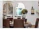 Dining room featuring a large table, seating for eight, chandelier, and decor at 21632 W Hillcrest Blvd, Buckeye, AZ 85396