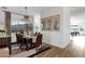 Dining room featuring a large table, seating for eight, chandelier, and mountain views at 21632 W Hillcrest Blvd, Buckeye, AZ 85396