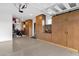 Well-organized garage with custom cabinets and visible storage for recreational items, offering a tidy and functional space at 21632 W Hillcrest Blvd, Buckeye, AZ 85396