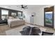 Stylish bedroom with a mountain view, multiple windows, and modern décor at 21632 W Hillcrest Blvd, Buckeye, AZ 85396