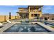 Inviting backyard pool, spa, and patio create a relaxing oasis for entertaining and enjoying the outdoors at 21632 W Hillcrest Blvd, Buckeye, AZ 85396
