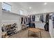 Spacious walk-in closet includes rods, shelving, a table, and shoe racks for optimal organization at 21632 W Hillcrest Blvd, Buckeye, AZ 85396