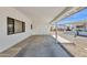 Spacious carport with white columns and storage area at 2241 N Nicklaus Dr, Mesa, AZ 85215