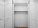 The closet offers ample storage space with multiple shelves and rods at 2241 N Nicklaus Dr, Mesa, AZ 85215