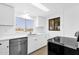 Bright kitchen with stainless steel appliances and quartz countertops at 2241 N Nicklaus Dr, Mesa, AZ 85215