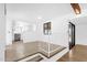 Open-concept living room with tile floors and modern staircase at 2241 N Nicklaus Dr, Mesa, AZ 85215