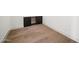 Bright office space with hardwood flooring and convenient desk with storage cabinets at 23002 N Country Club Trl, Scottsdale, AZ 85255