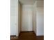 A bright, empty walk-in closet space offers ample storage and organization opportunities in the home at 23002 N Country Club Trl, Scottsdale, AZ 85255