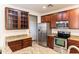 Well-equipped kitchen with granite counters, stainless steel appliances, and ample storage space at 25640 N 108Th Dr, Peoria, AZ 85383