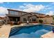 Stunning backyard pool with a spacious patio and lush landscaping, perfect for outdoor relaxation and entertainment at 26391 N 107Th Dr, Peoria, AZ 85383