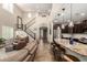 Open floor plan that seamlessly blends the kitchen and living spaces at 26391 N 107Th Dr, Peoria, AZ 85383