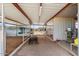 Interior view of barn featuring metal roof, multiple stalls, and ample space for livestock at 28025 N 156Th Pl, Scottsdale, AZ 85262