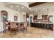 Spacious kitchen with island seating, custom cabinetry, and stainless steel appliances at 28025 N 156Th Pl, Scottsdale, AZ 85262