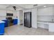 Updated kitchen showcases white cabinetry, stainless appliances, and an adjacent built-in desk area at 3315 E Taro Ln, Phoenix, AZ 85050