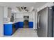 Spacious kitchen featuring tile flooring, stainless steel appliances, and plenty of cabinet space at 3315 E Taro Ln, Phoenix, AZ 85050