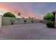 Spacious backyard with privacy wall and desert landscaping, ideal for outdoor enjoyment at 3443 E Wickieup Ln, Phoenix, AZ 85050