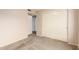 Bedroom with a closet featuring sliding doors, perfect for storage and organization at 3443 E Wickieup Ln, Phoenix, AZ 85050