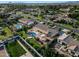 This stunning home features a backyard oasis with a pool, spa, covered patio, and lush landscaping at 3531 E Norwood Cir, Mesa, AZ 85213