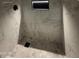 Walk-in shower with decorative tiles and niche at 3849 W Mauna Loa Ln, Phoenix, AZ 85053