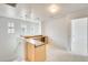 Bonus room featuring built-in desk with counter, storage and track lighting at 4041 W Hackamore Dr, Phoenix, AZ 85083