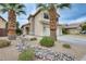 Charming two-story home with desert landscaping, a two car garage, and an inviting front entry at 4041 W Hackamore Dr, Phoenix, AZ 85083