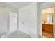 Hallway featuring bathroom access at 4041 W Hackamore Dr, Phoenix, AZ 85083