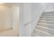 Carpeted staircase with handrail access at 4041 W Hackamore Dr, Phoenix, AZ 85083