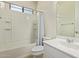 Well-lit bathroom with a shower-tub combo, complemented by a white vanity and modern fixtures at 4236 N 27Th St # 37, Phoenix, AZ 85016