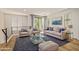 Inviting living room featuring stylish furniture, decor, and abundant natural light at 4236 N 27Th St # 37, Phoenix, AZ 85016