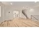 Open concept living room seamlessly integrates with the kitchen and staircase for modern living at 4236 N 27Th St # 37, Phoenix, AZ 85016