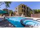 Exterior shot of a community pool and hot tub, perfect for relaxation and recreation at 4236 N 27Th St # 37, Phoenix, AZ 85016