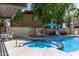 Inviting community pool area with a hot tub, lounge chairs, and shade for ultimate relaxation at 4236 N 27Th St # 37, Phoenix, AZ 85016
