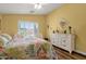 Bedroom features a window with shutters and a white dresser at 4332 E Cassia Ln, Gilbert, AZ 85298