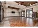 Large event space with tile floors, neutral walls and a wood-paneled ceiling offering a flexible venue at 43615 W Roth Rd, Maricopa, AZ 85138