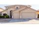 Spacious, two-story home featuring a three-car garage and manicured landscaping at 43615 W Roth Rd, Maricopa, AZ 85138