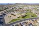 Community aerial view features homes, parks, and streets showcasing the neighborhood's layout and amenities at 4407 W Avenida Del Sol --, Glendale, AZ 85310