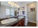Well-lit bathroom featuring double sinks, modern fixtures, and a neutral color palette at 4407 W Avenida Del Sol --, Glendale, AZ 85310