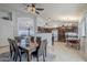 Open-concept dining area seamlessly connects to the kitchen and living room at 4407 W Avenida Del Sol --, Glendale, AZ 85310