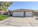 Spacious home with a three-car garage and a well-maintained front yard at 4407 W Avenida Del Sol --, Glendale, AZ 85310