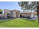 Attractive single-Gathering home with a well-maintained lawn, stone accents, and a welcoming entrance at 4407 W Avenida Del Sol --, Glendale, AZ 85310