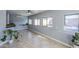 Open concept living area with tile floors, many windows, and neutral paint at 4407 W Avenida Del Sol --, Glendale, AZ 85310